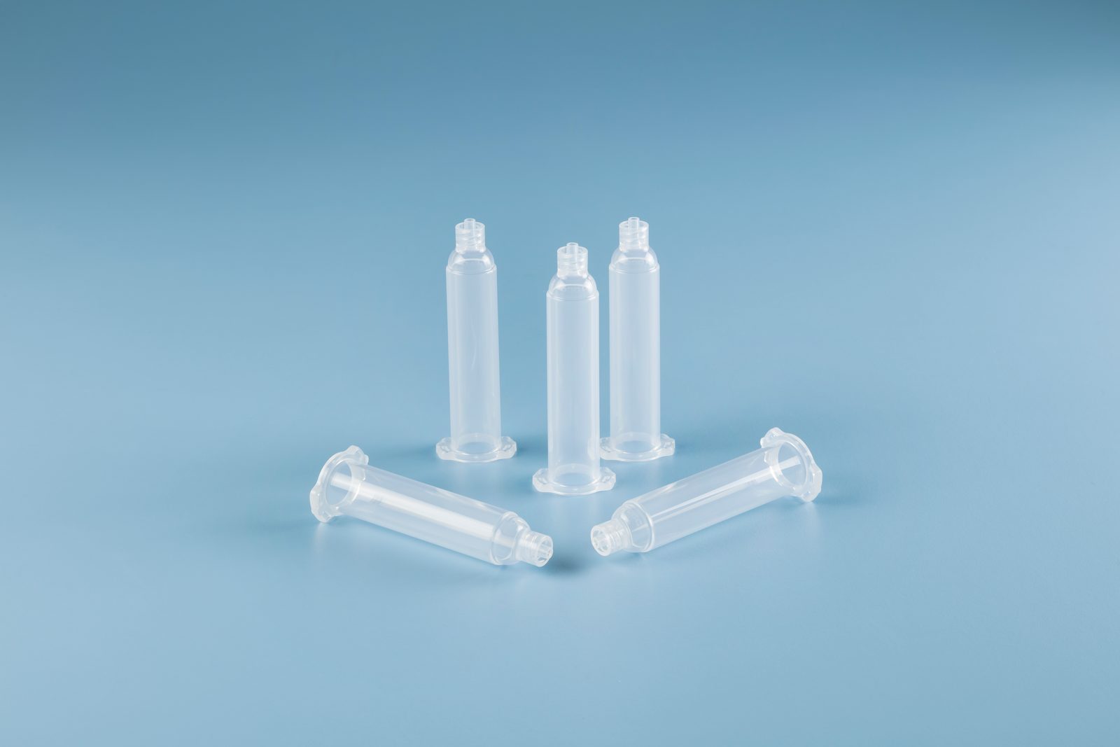 Clear 10cc Nordson EFD Optimum syringe barrels with blue pistons